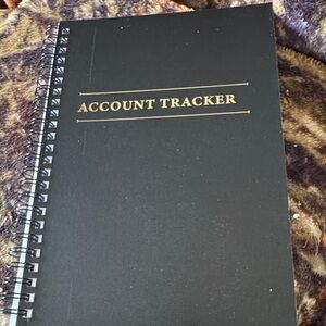 Black Account Tracker Notebook